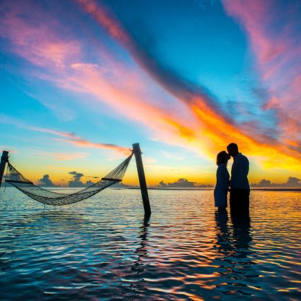 Silhouette Photo Couple Kissing Each Other during Sunset