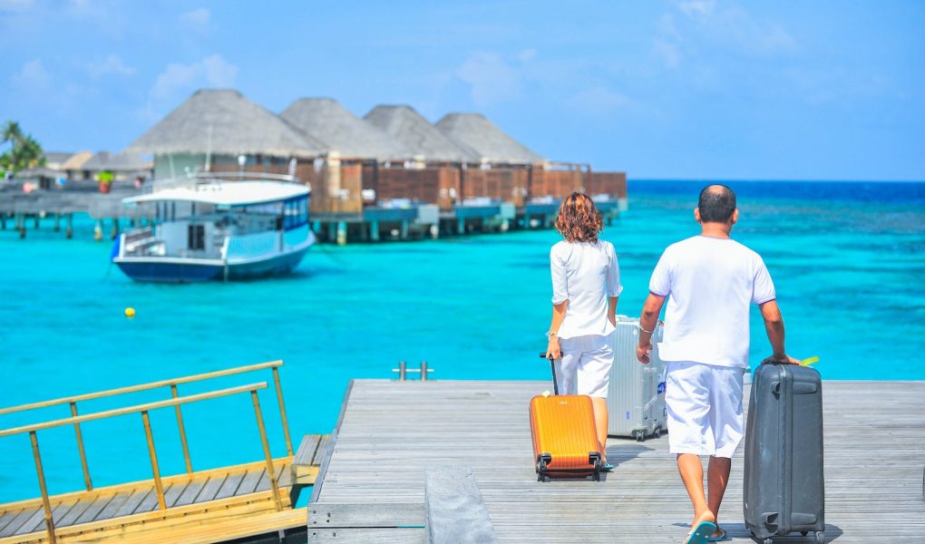 Man and Woman Walks on Dock