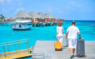 Man and Woman Walks on Dock